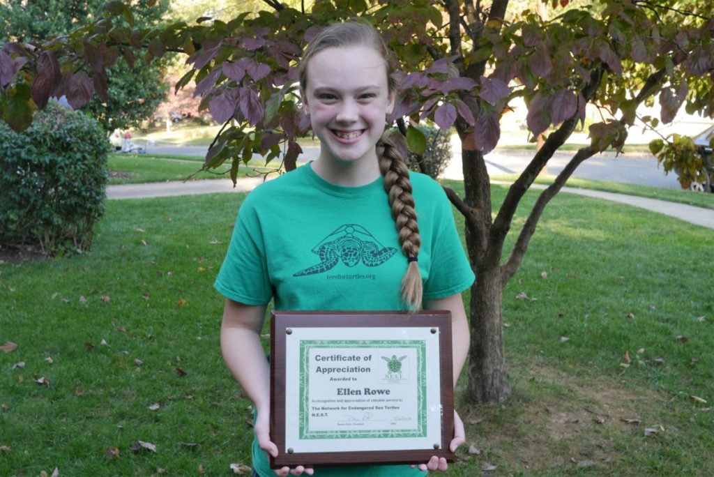 Ellen with her NEST appreciation certificate