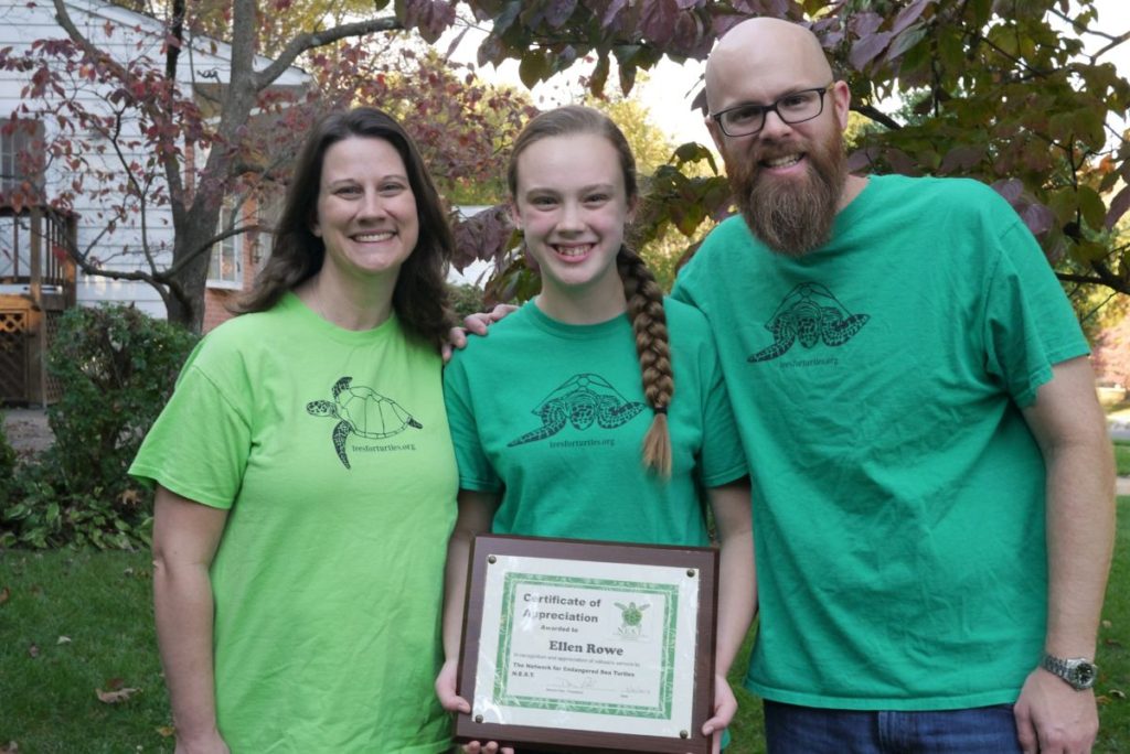 Ellen and her parents with their tees for turtles shirts